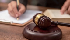 Lawyer with contract and gavel