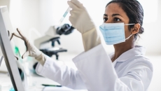 Technician working in a lab Technician working in a lab
