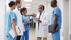 Healthcare professionals in a consultation Healthcare professionals in a consultation