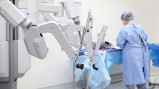 Technician preparing surgical robot Technician preparing surgical robot