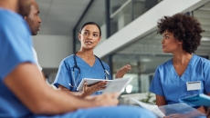 Healthcare providers sitting in a circle Healthcare providers sitting in a circle