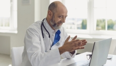 Healthcare provider on a computer Healthcare provider on a computer