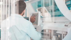 Technician working in a lab Technician working in a lab