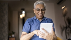 Older man using a tablet