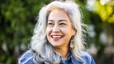 Person with gray hair smiling Person with gray hair smiling