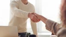 two people shaking hands