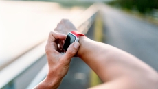 A close up of a person wearing a smartwatch A close up of a person wearing a smartwatch