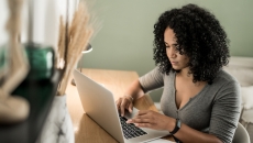 A person using a laptop A person using a laptop
